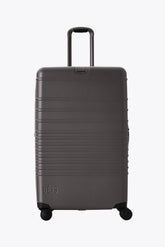 The Large Check-In Roller in Charcoal