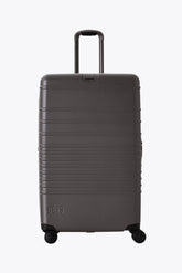 Resale The Large Check-In Roller in Charcoal