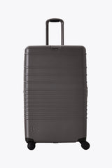 Resale The Large Check-In Roller in Charcoal